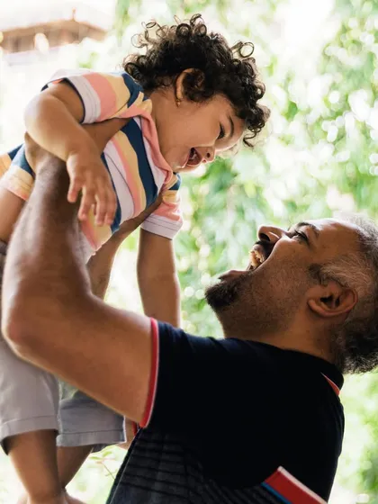 The pure, explosive joy of being tossed in the air by dad. These are the action shots, the moments of laughter and trust that I make sure to capture during our family sessions. It’s a memory of pure happiness.