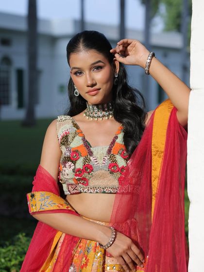 Soaking in the radiance of this beautiful sunkissed Haldi look. We created a soft glam style with a focus on glowing skin and a chic ponytail.