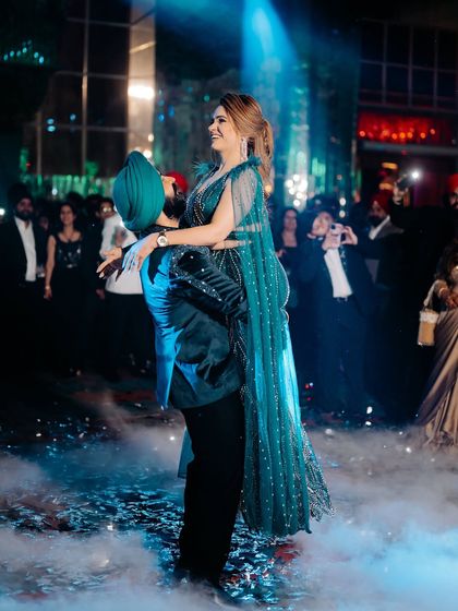 The couple's first dance. Her makeup is designed to be sweat-proof and long-lasting, looking flawless even on the dance floor.