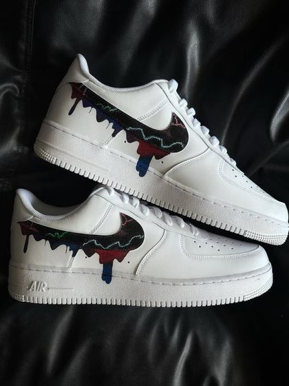 A top-down view of the galaxy drip custom sneakers.