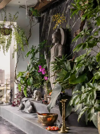 This is a glimpse of a sunroom we helped create on the 20th floor of a home, a true garden in the sky. Our standing Buddha statue serves as the tranquil centerpiece, showing how our sculptures can transform both personal and designed spaces.