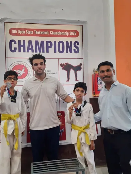 Our students on the podium at the 8th Open State Taekwondo Championship. Their hard work and training resulted in a great showing.