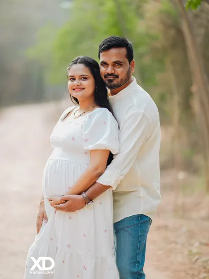 A simple and sweet outdoor portrait of a couple, capturing a moment of quiet connection.