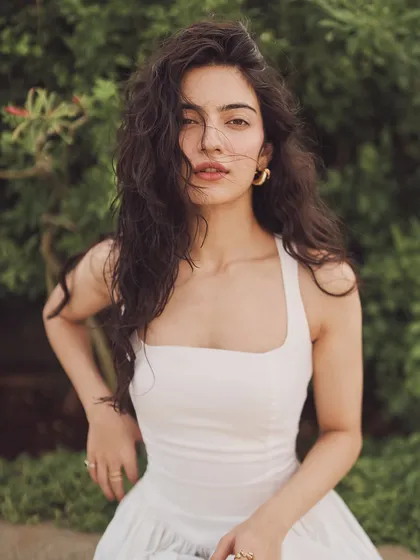 The beautiful Pratibha Ranta in a simple white sundress. This look is all about natural beauty and effortless style, perfect for a summer event.