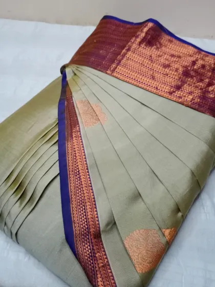 Say goodbye to messy drapes with this elegant beige and maroon silk saree. My pre-pleating service ensures a polished look every single time.