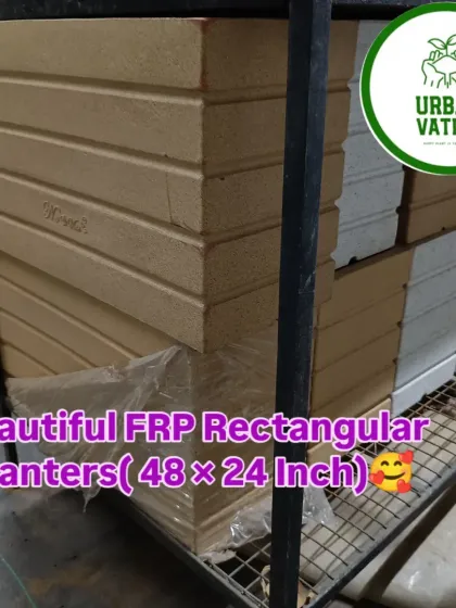 These are large FRP rectangular planters, 48 by 24 inches, stacked and ready for a big landscaping project. They are extremely durable.