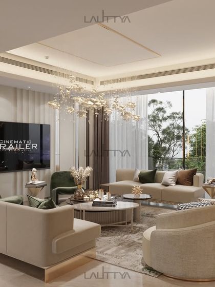 This angle showcases the connection to the outdoors, with large glass windows flooding the space with natural light. The furniture layout is kept open and airy, complementing the expansive view and creating a serene atmosphere.