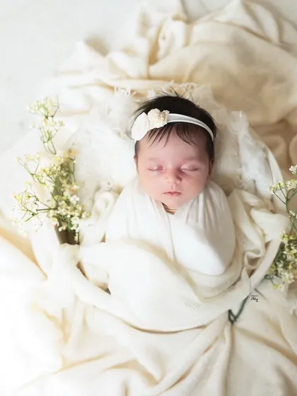 An overhead view of this classic white setup, showing the baby nestled safely in a bowl, looking like a precious pearl.