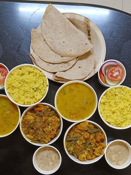 A spread of multiple trial meals ready to go out for delivery. It's a great way for new customers to experience my cooking.