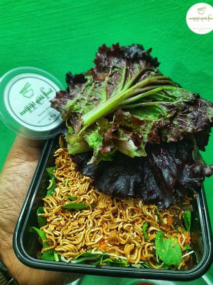 My Mimi Singju, made with crunchy noodles and fresh greens, is now on the menu by popular demand.