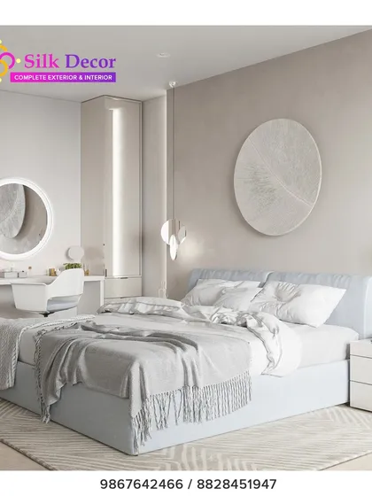 This serene bedroom features one of our simple, light blue upholstered beds. The clean lines and understated design create a calm and airy feel, proving that luxury can also be found in simplicity. The bed is paired with a custom white vanity set.