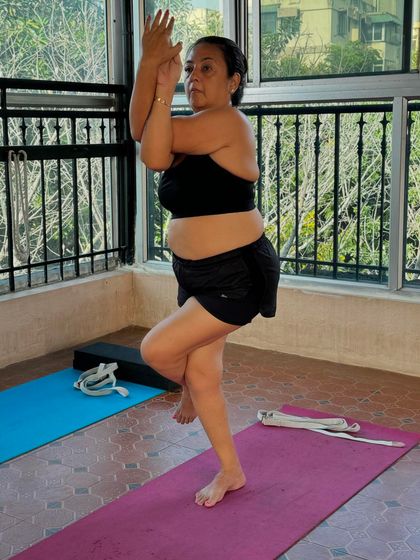 Garudasana, or Eagle Pose, is a challenging balance that also opens the shoulder and hip joints. Practicing this in class helps improve focus and stability, and we always find a way to make it work for everyone.