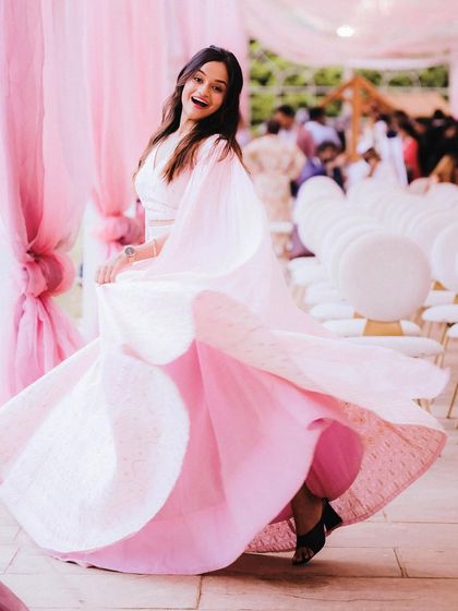 Feeling like a Barbie girl in this beautiful pink outfit for a daytime event. The twirl was mandatory! My style is all about being vibrant, fun, and fitting the mood of the celebration.