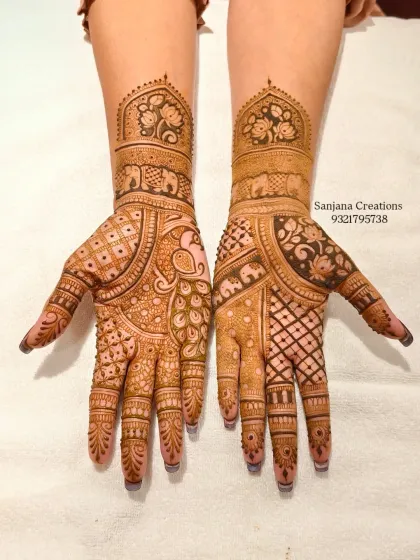 Both hands together, showcasing the complete, symmetrical, and intricate bridal design.