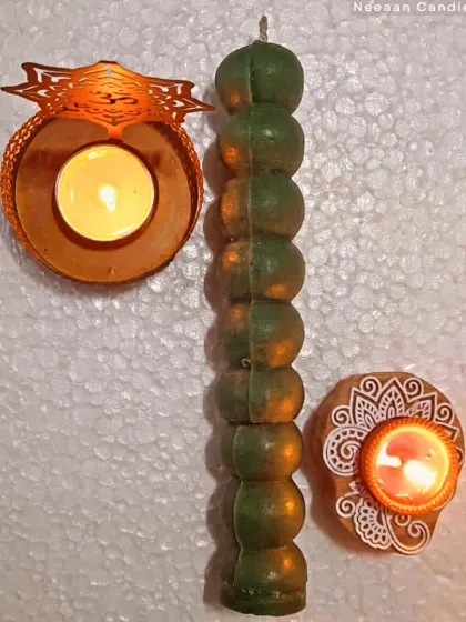 Add a touch of earthy elegance to your space with our Green Knob Candle, where rustic charm meets cozy vibes.