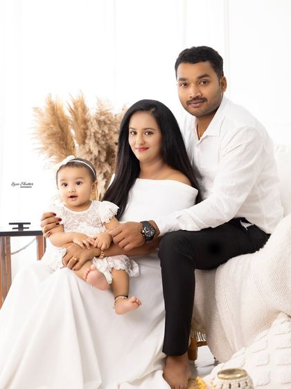 A formal family portrait with everyone looking at the camera. We always include these classic shots that are perfect for sharing with grandparents and extended family.