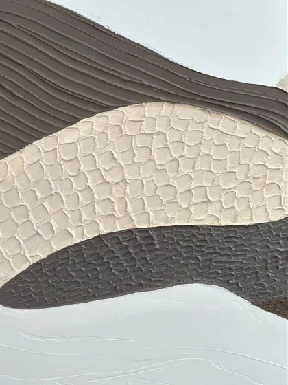 A close-up of the varied textures in the abstract landscape. You can see the combed lines, dotted patterns, and smooth sections that come together to form the whole.