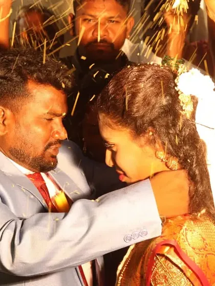 The peak of the ceremony. This is the sacred moment of the thaali tying, captured with a dynamic feel as family and friends shower the couple with blessings and flower petals. I focus on capturing the emotion and significance of these core rituals.