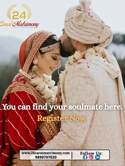 A groom's tender forehead kiss for his bride. You can find your soulmate here and begin a lifetime of cherished moments like this one.