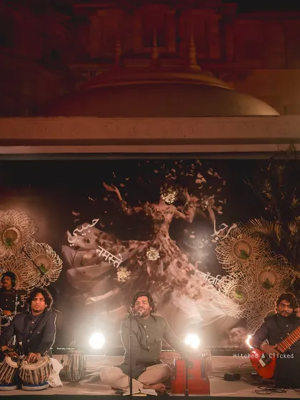 A live Sufi band performs against a custom art backdrop. I blend visual art with live music to create a multi-sensory experience for guests during a reception or welcome dinner.
