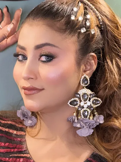 A close-up of the eye makeup, showing the sharp liner and perfectly blended shadow.