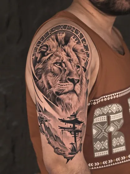 We specialize in black and grey realism that feels alive. This lion and landscape half-sleeve combines the raw power of nature with serene symbolism, using detailed shading to create depth and a truly majestic presence on the arm.