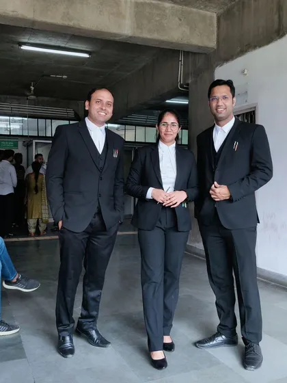 Our team of advocates inside a court complex. We believe that a strong presence in court is key to effective representation, and our lawyers are always prepared for the courtroom battle.