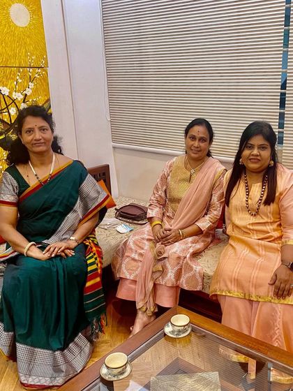 Sharing a moment with our valued guests in the lounge. Their comfort and happiness are my top priorities.