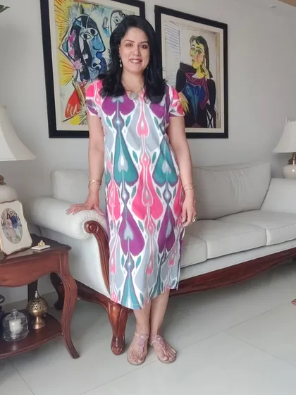 While I often lean towards pastels, I love playing with vibrant colours and prints. This colourful Ikat cotton dress is so cheerful and comfortable, perfect for a happy day out with friends. It’s about finding pieces that bring you joy.