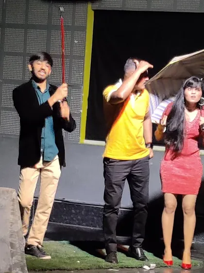 A comedic scene from "The Good Doctor" showcase, with students using props and physical comedy to entertain the audience.