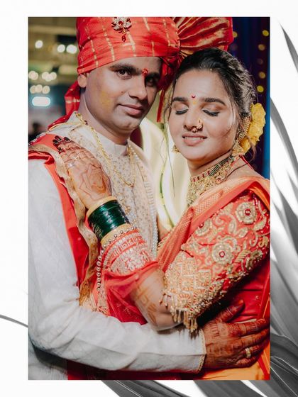 An intimate embrace between Purva and Dharma, capturing the soft emotions and intricate details of their wedding outfits.