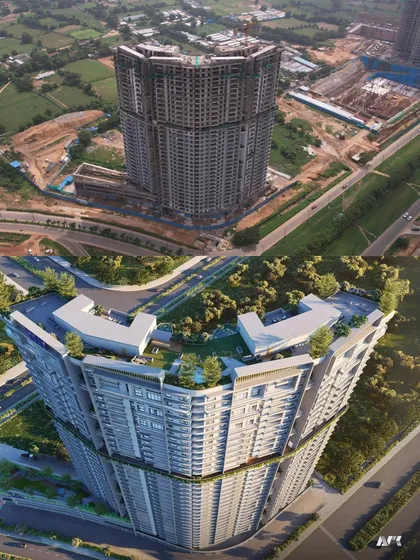 An aerial comparison of the Reva residential project in GIFT City, Gujarat, showing the construction progress against the final render. This 35-storey high-rise is rapidly taking shape.