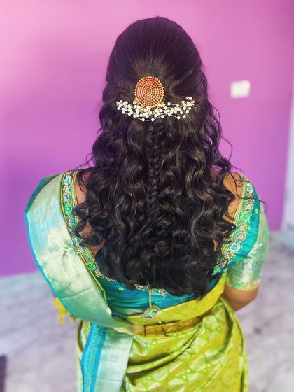 The full back view of the beautiful hairstyle.