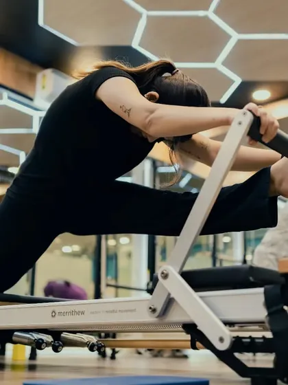 This deep lunge stretch on the reformer targets the hip flexors and quadriceps. It's an essential movement for anyone looking to improve lower body flexibility and prevent tightness.