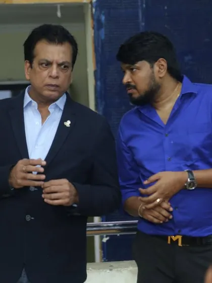 In discussion with a member of the organizing committee. Flawless execution of our national championships requires meticulous planning and communication.