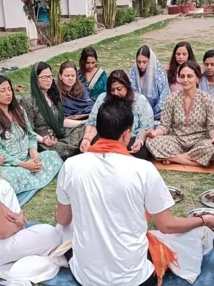 A group of students participating in the opening Hawan ceremony for our 300-hour YTTC.