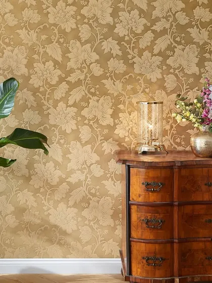 A rich, golden floral damask wallcovering that adds a touch of opulence and warmth. This design from the Trianon collection is perfect for creating a luxurious and traditional ambiance.