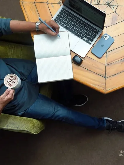Work should be comfortable. That's why I've filled my space with cozy seating, a laptop-friendly table, and a warm cup of coffee to keep you going through your tasks.