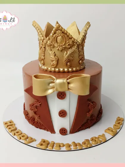 A cake fit for a king. This regal design for a "Boss" features a rich brown fondant, a tuxedo detail, and a magnificent, handcrafted golden crown on top.