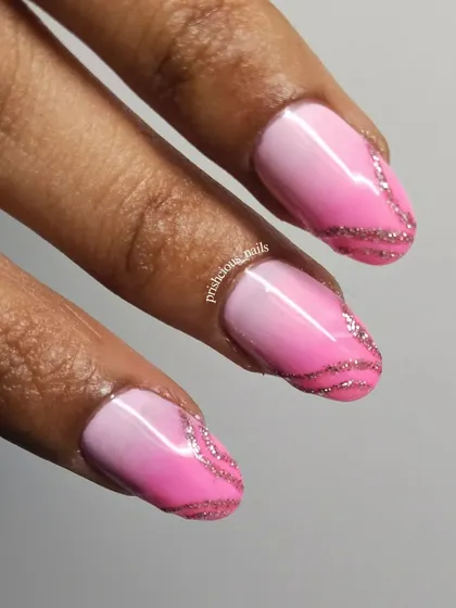 A close-up of the pink ombré and glitter swirl details. The gradient is super smooth, and the reflective glitter adds so much dimension.