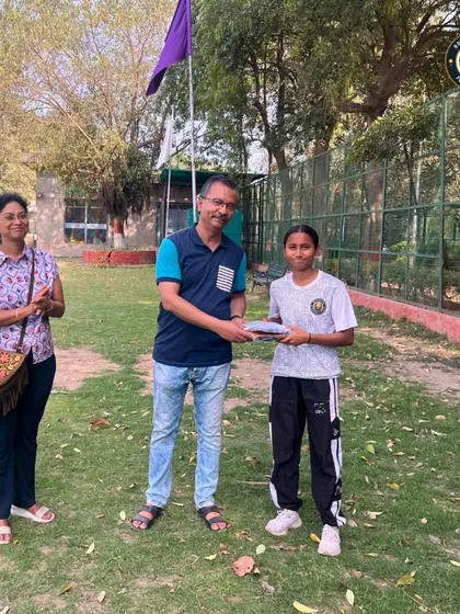 Another player from our girls' team receiving her new kit from our wonderful supporters. We are grateful for their belief in our journey.