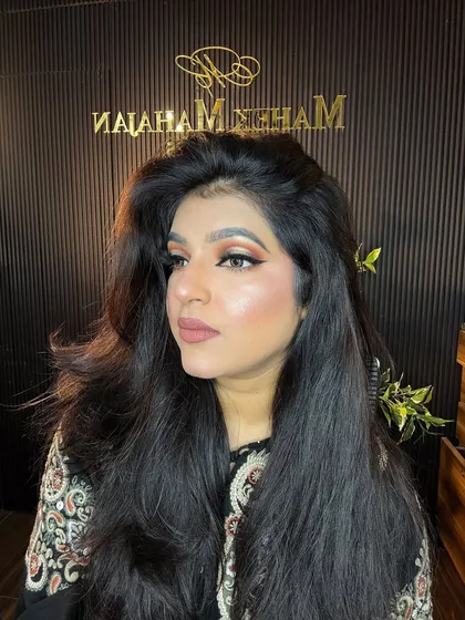 A side profile, highlighting the glowing skin and the shape of the winged liner.