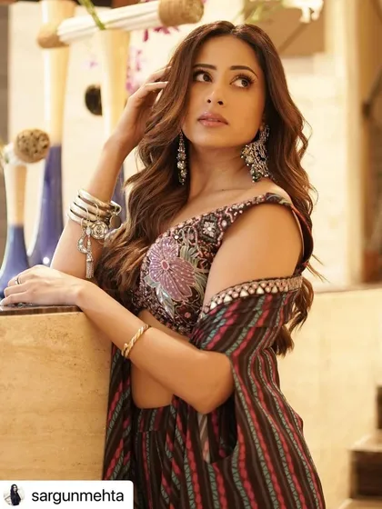 The caramel highlights in Sargun Mehta's hair add beautiful dimension and warmth.