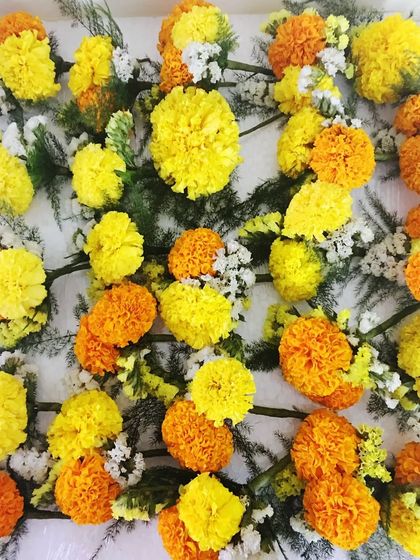 A photo from my archives of marigolds being prepped for a shoot. The vibrant colors and textures found in everyday life, especially during festive seasons in India, are a constant source of inspiration for my prop styling.