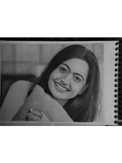 Itne pyaare bhi naa bano, ke aapko humari nazar lag jaye. A sketch of the national crush, Rashmika Mandanna, capturing her radiant smile.