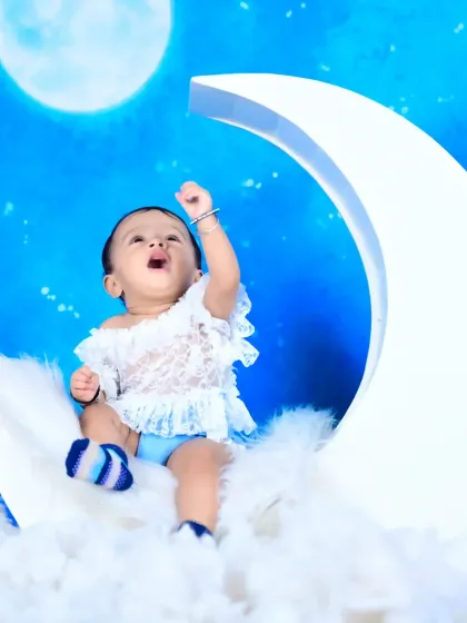 Another angle from the "baby on the moon" shoot, showing the baby reaching for the stars.