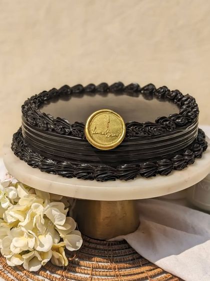 Our Dutch Truffle cake is simple, sinful, and stunning. It's made with a decadent chocolate ganache and a super moist cake sponge for a classic, timeless dessert.