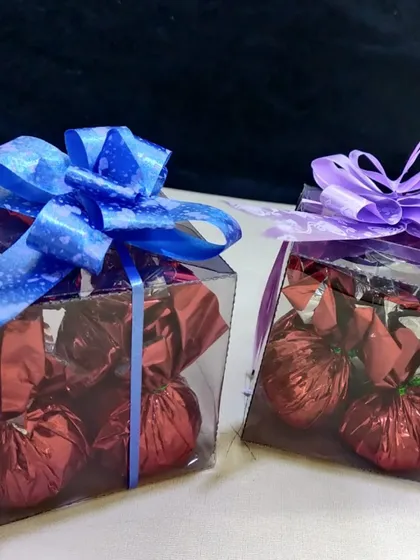 My Mini Chocolate Bomb Cubes. These clear boxes filled with foil-wrapped chocolates are a perfect small gift or party favor.
