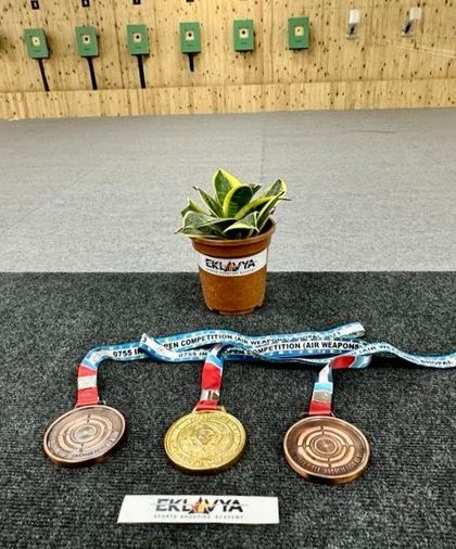 The gold, silver, and bronze medals from our Independence Day competition, beautifully displayed at our academy.
