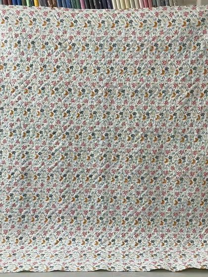 The simple floral backing fabric.
